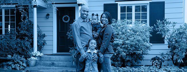 family outside of a house