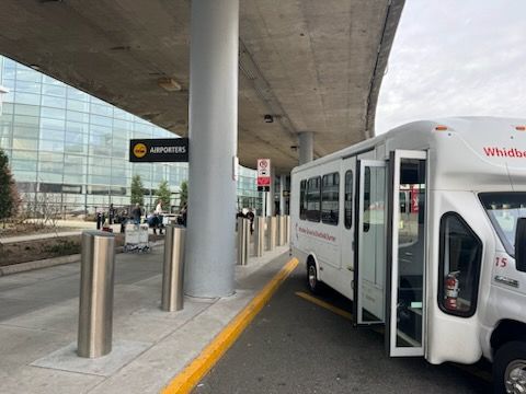 Whidbey SeaTac Shuttle at airport curb
