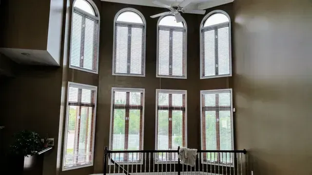A room with a lot of windows and a ceiling fan Love is Blinds Arizona (844) 936-2446