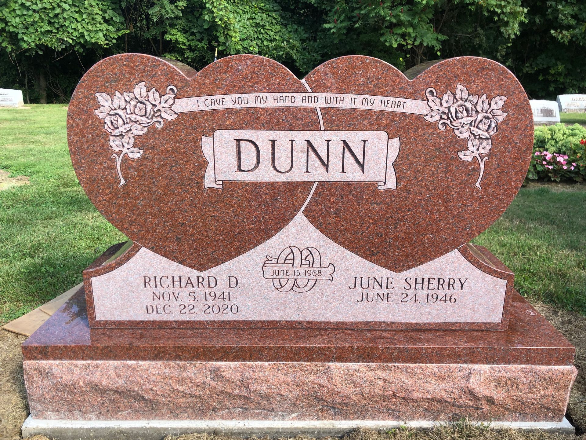 Heart-shaped pink gravestone engraved 