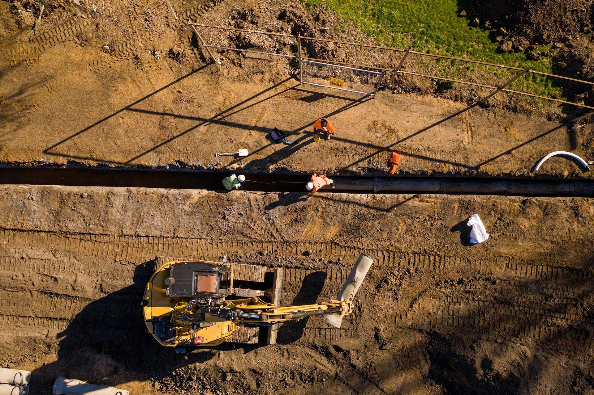 Earthworks and construction on job site at development project
