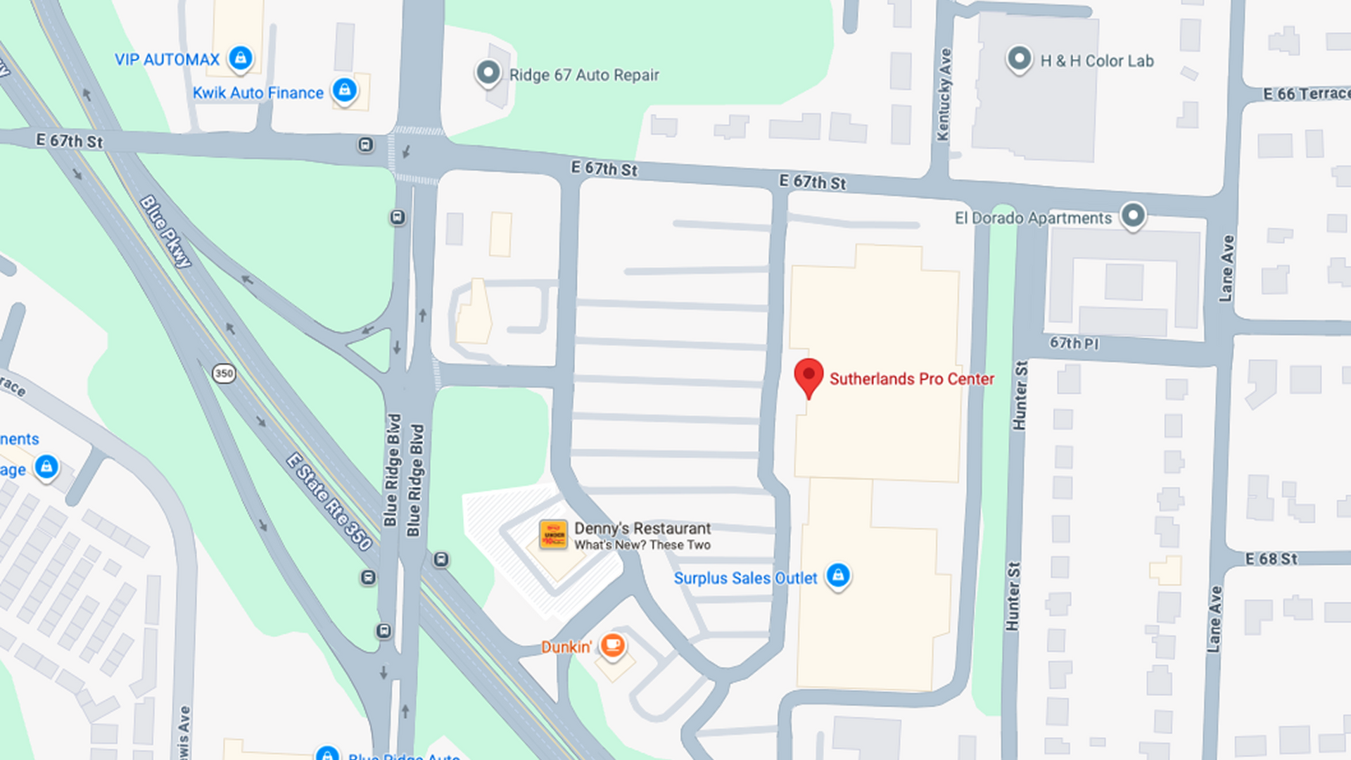 Map with a red location pin marking a spot near roads and buildings in an urban area
