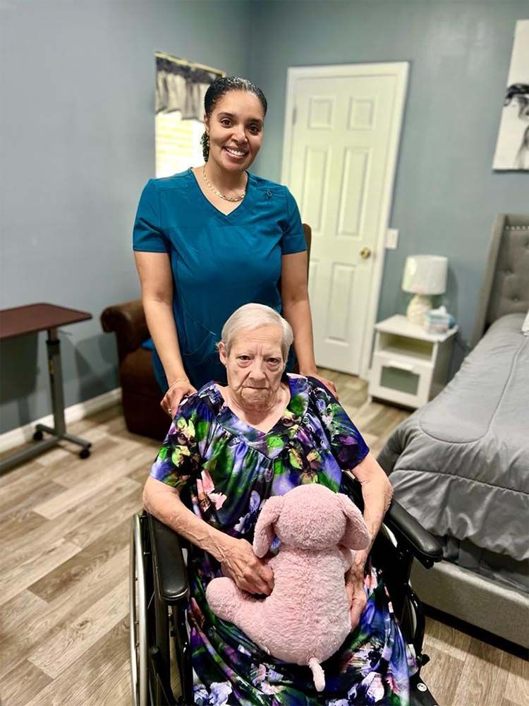 Female Personal Care Aide With Her Patient