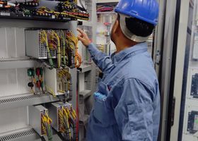 Commercial building electrical equipment being evaluated during a recertification inspection