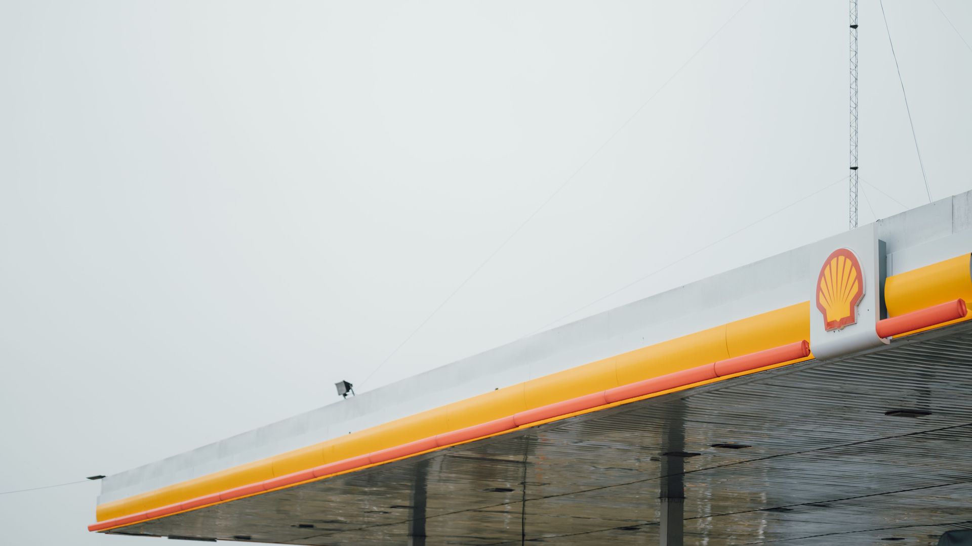 Florida gas station fuel canopy at dusk, subject to the state's emergency generator law