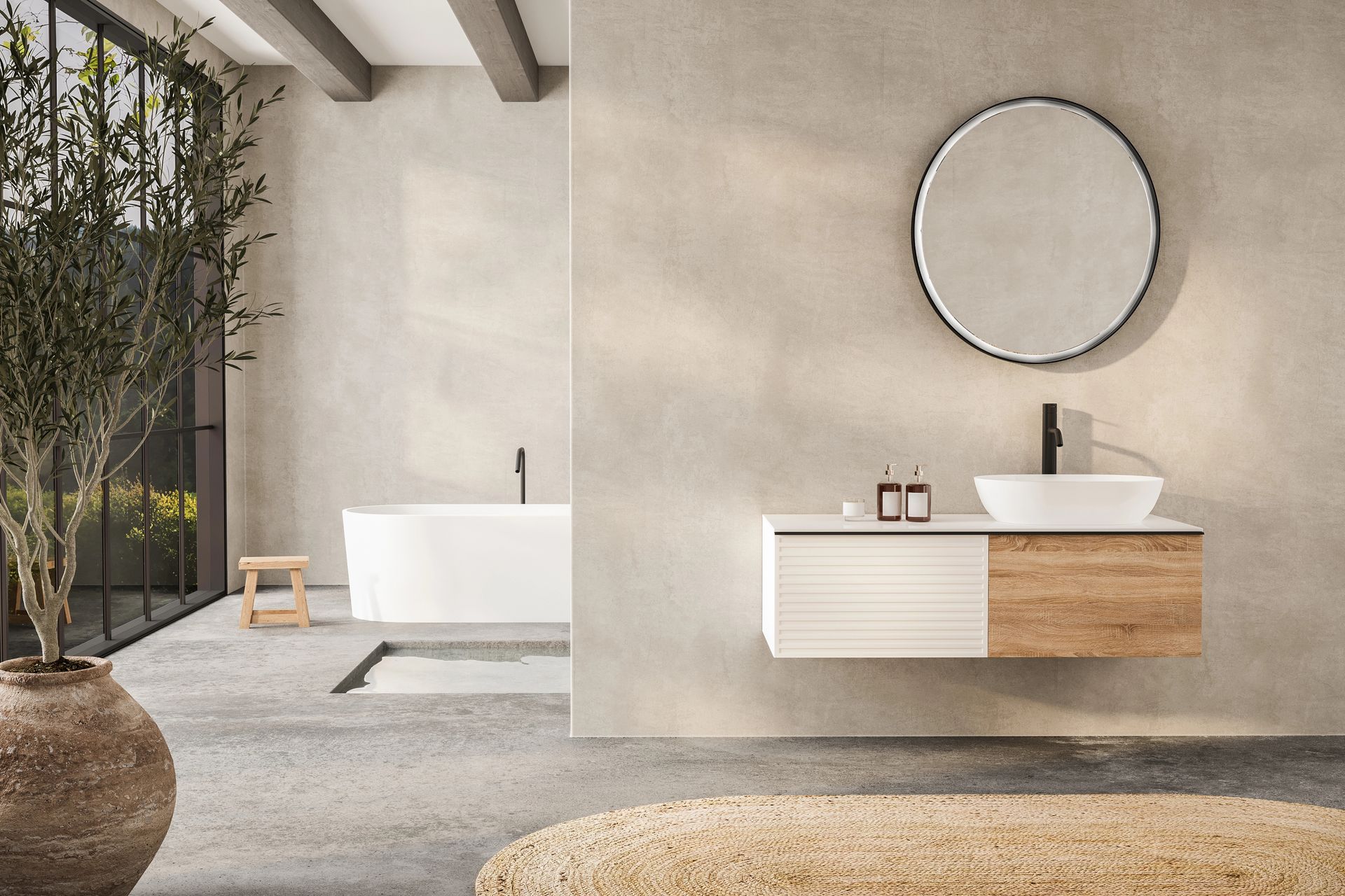 Bagno moderno con vasca freestanding, mobile lavabo sospeso, specchio rotondo e finiture effetto pietra.