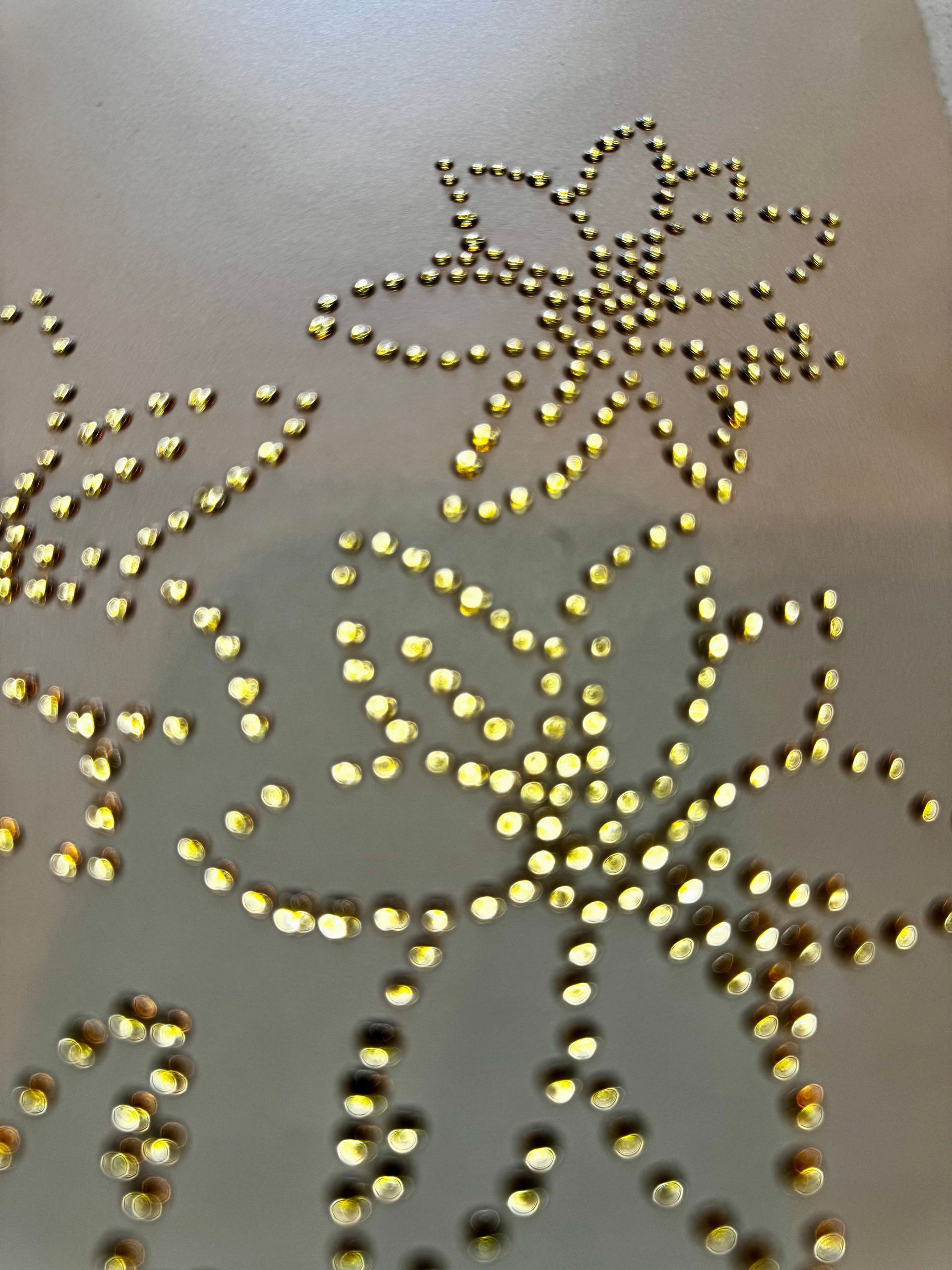 Brushed metallic ink on a premium label