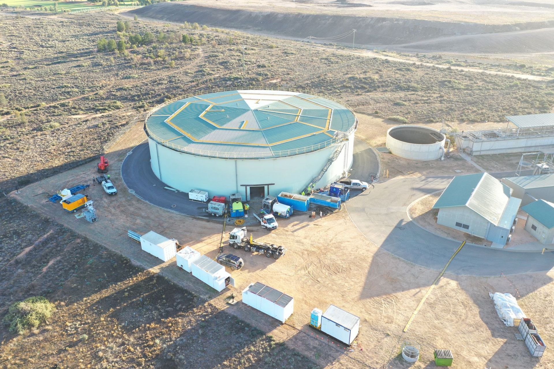 an active industrial staging site containing heavy equipment