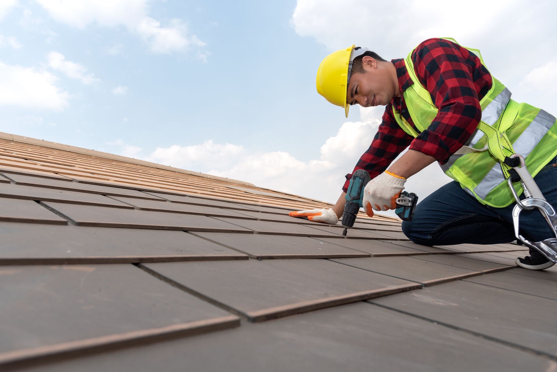 The mechanics of the house used electric drills to work on the roofs of the house.