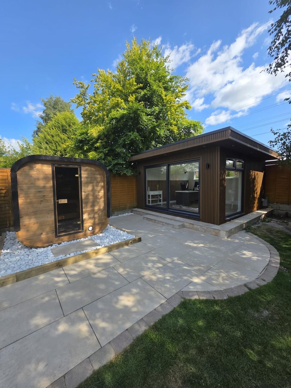 Completed Oakspan garden office in Newton Mearns with an external sauna later added by the client