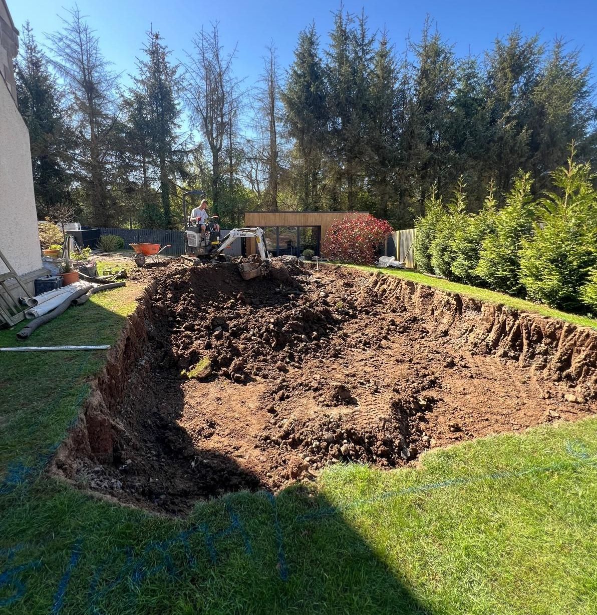 Excavation and foundation preparation for an Oakspan golf simulator garden room in Scotland