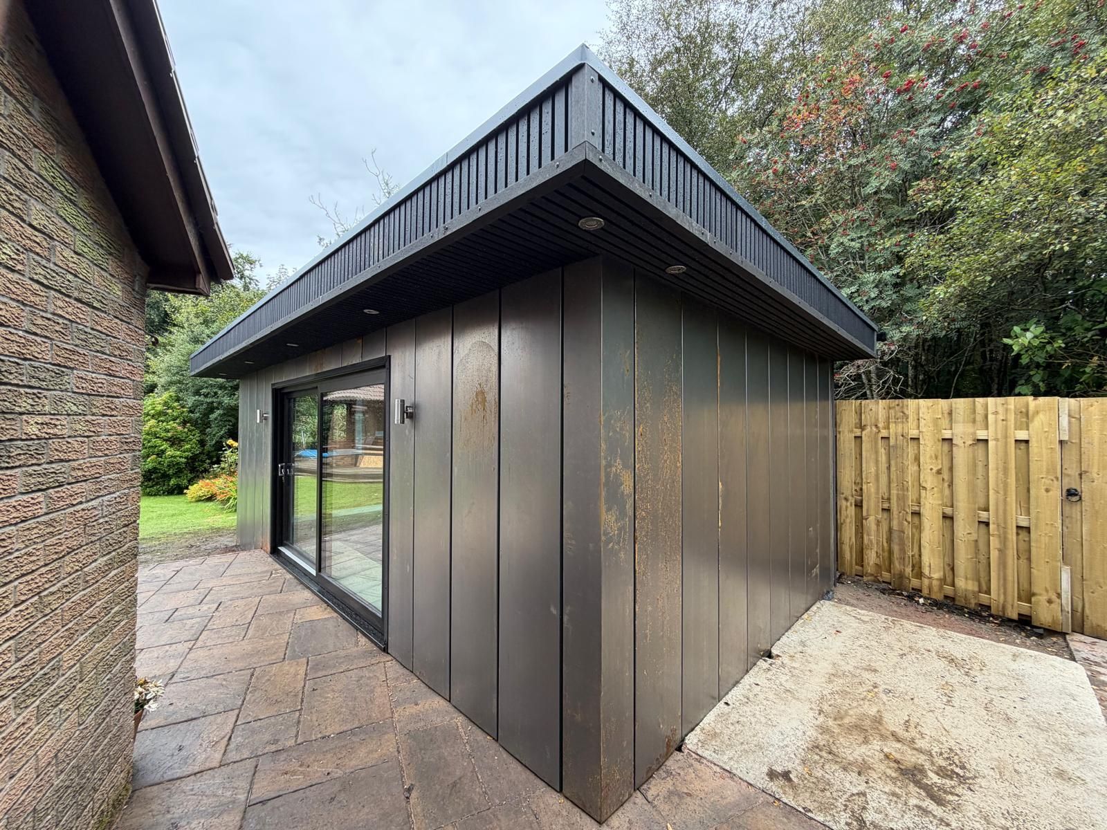 Oakspan garden art studio with oxidised-effect exterior cladding