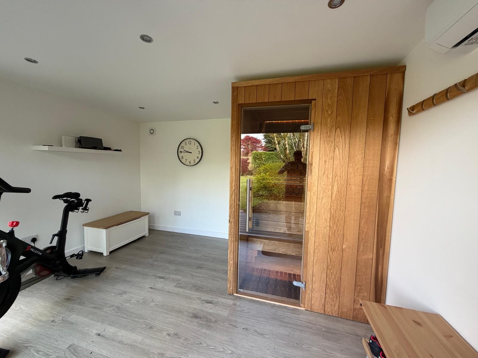 Compact Oakspan wellness garden room with exercise area and built-in sauna in Bridge of Weir