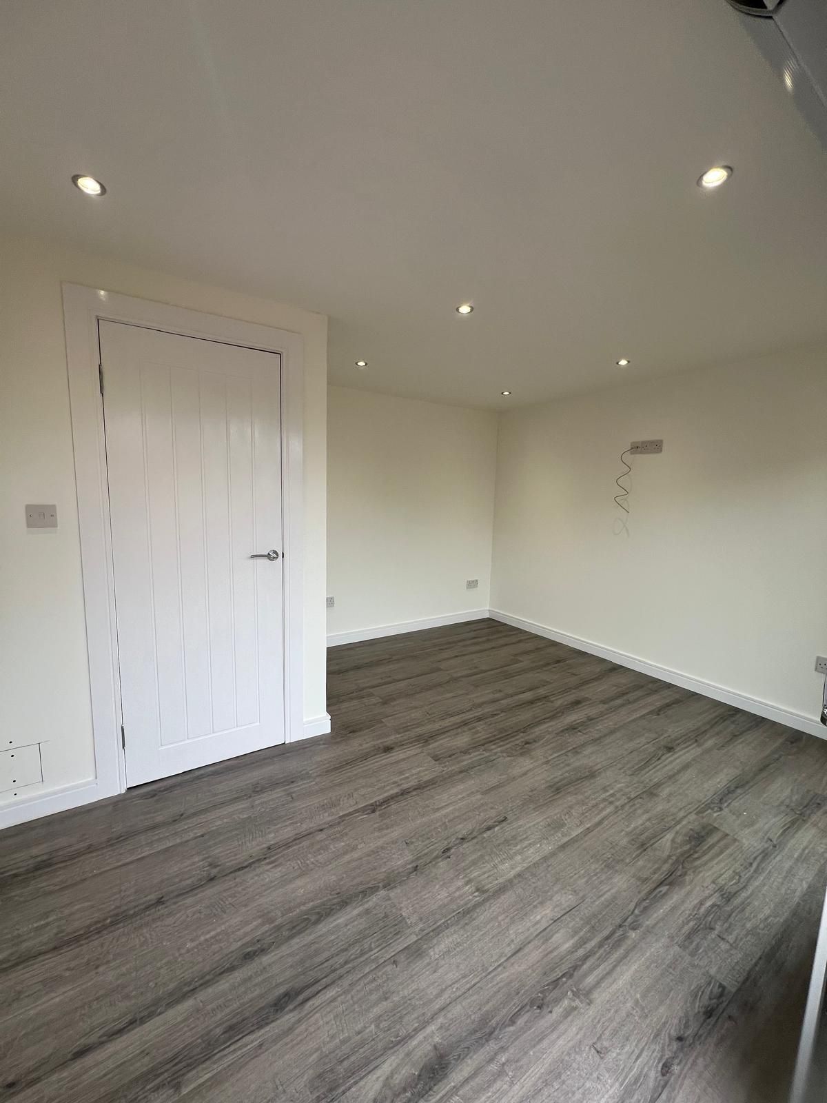 Completed interior of a compact 4.5m x 3.5m Oakspan garden room in Chryston