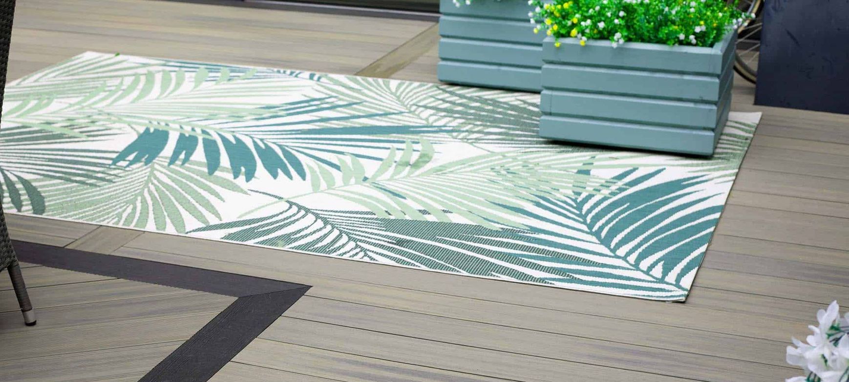 an extended deck to a garden room or garden room office