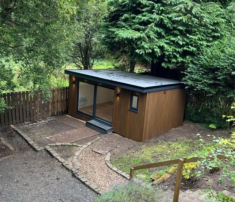 stylish garden room for work in garden