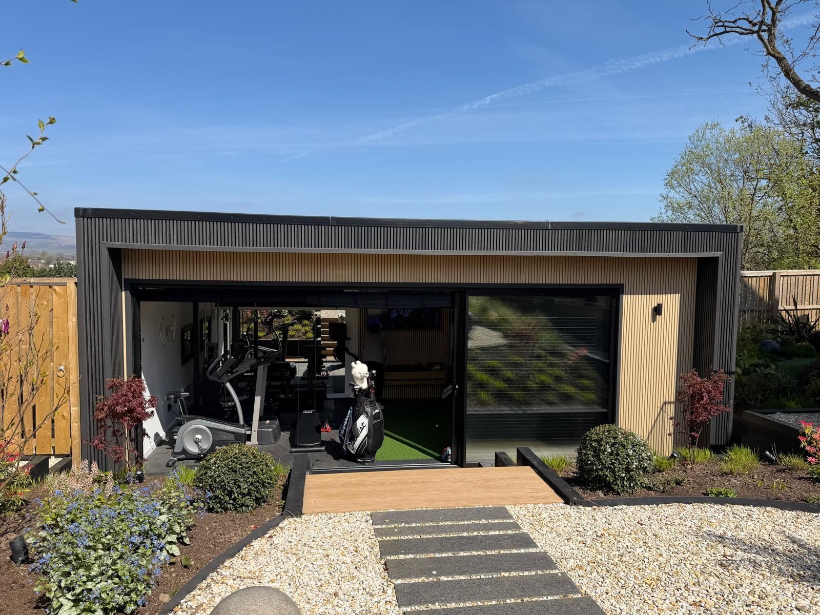 Completed Oakspan golf simulator gym and home cinema garden room in Jordanhill Glasgow