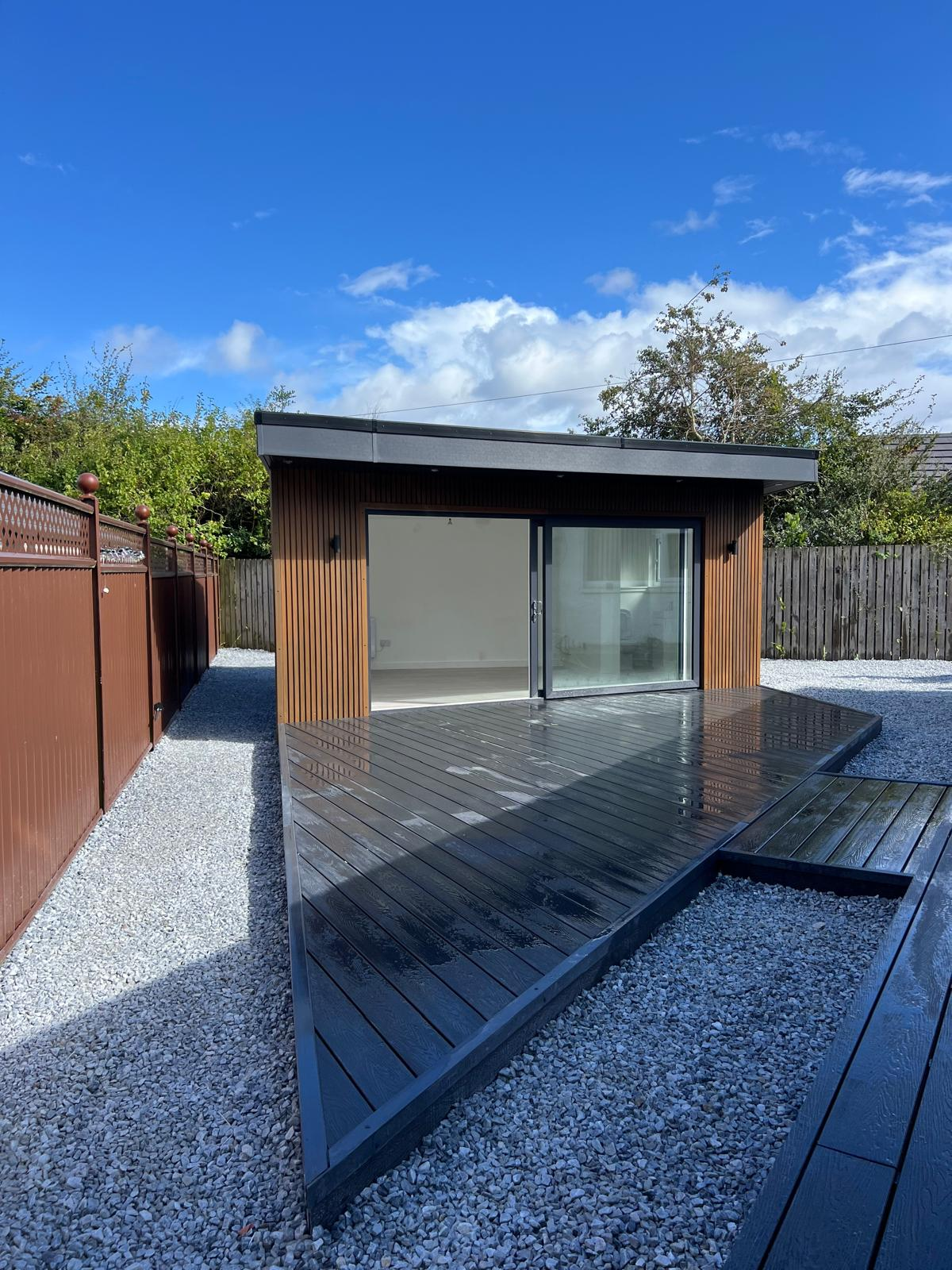 Oakspan garden room with fully plumbed toilet and composite decking in Kirkintilloch