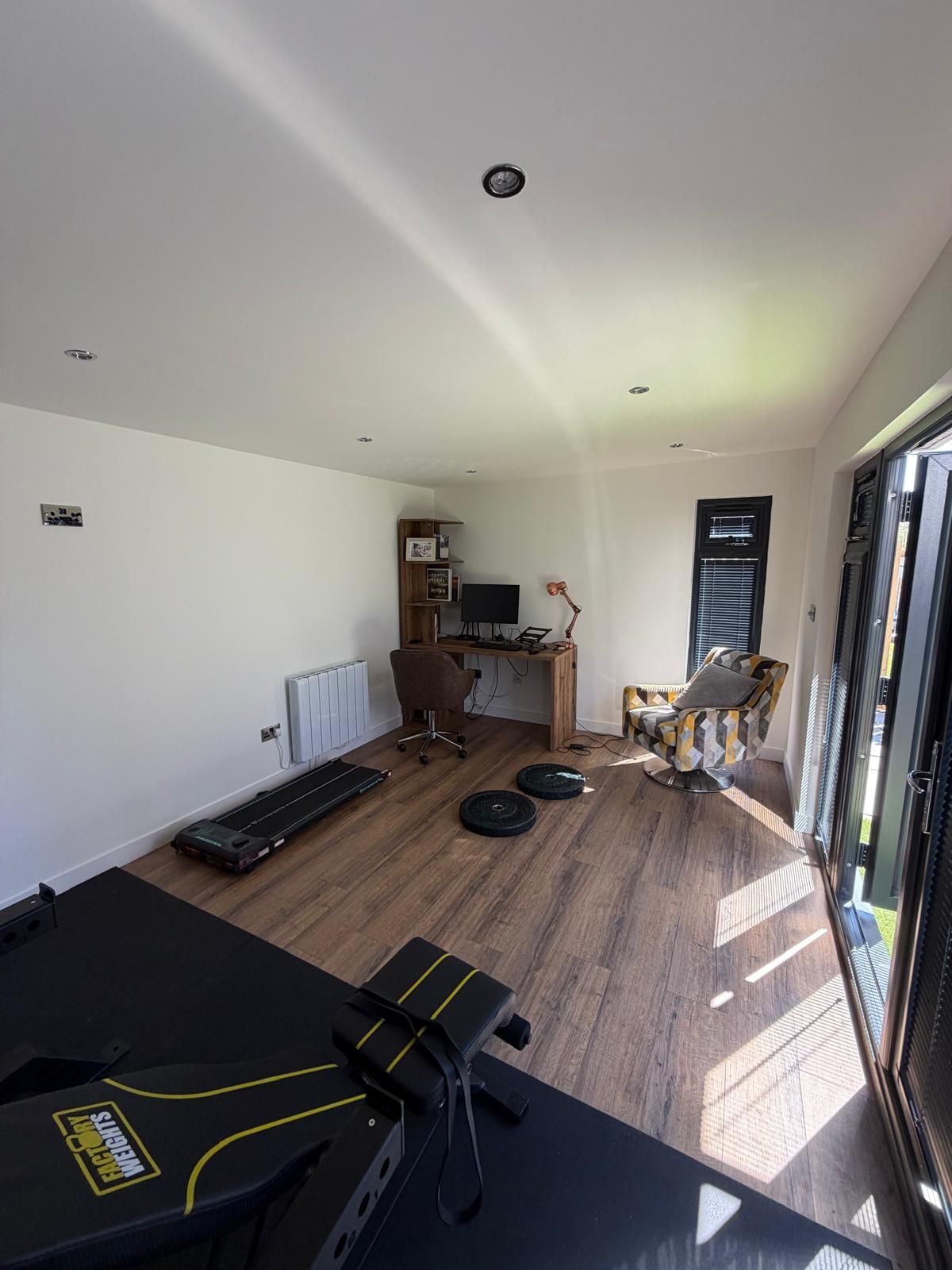 Garden Office And Home Gym Interior Multipurpose Oakspan garden room combining an office and home gym