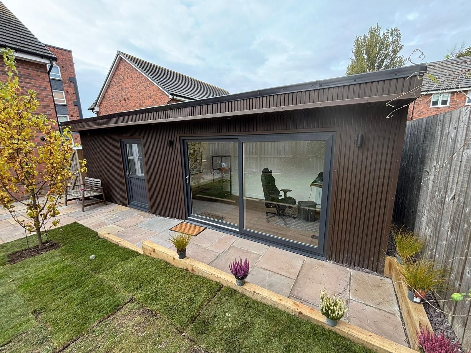 Garden Office With Integrated Storage In Garden Oakspan garden office with integrated storage set within a landscaped garden
