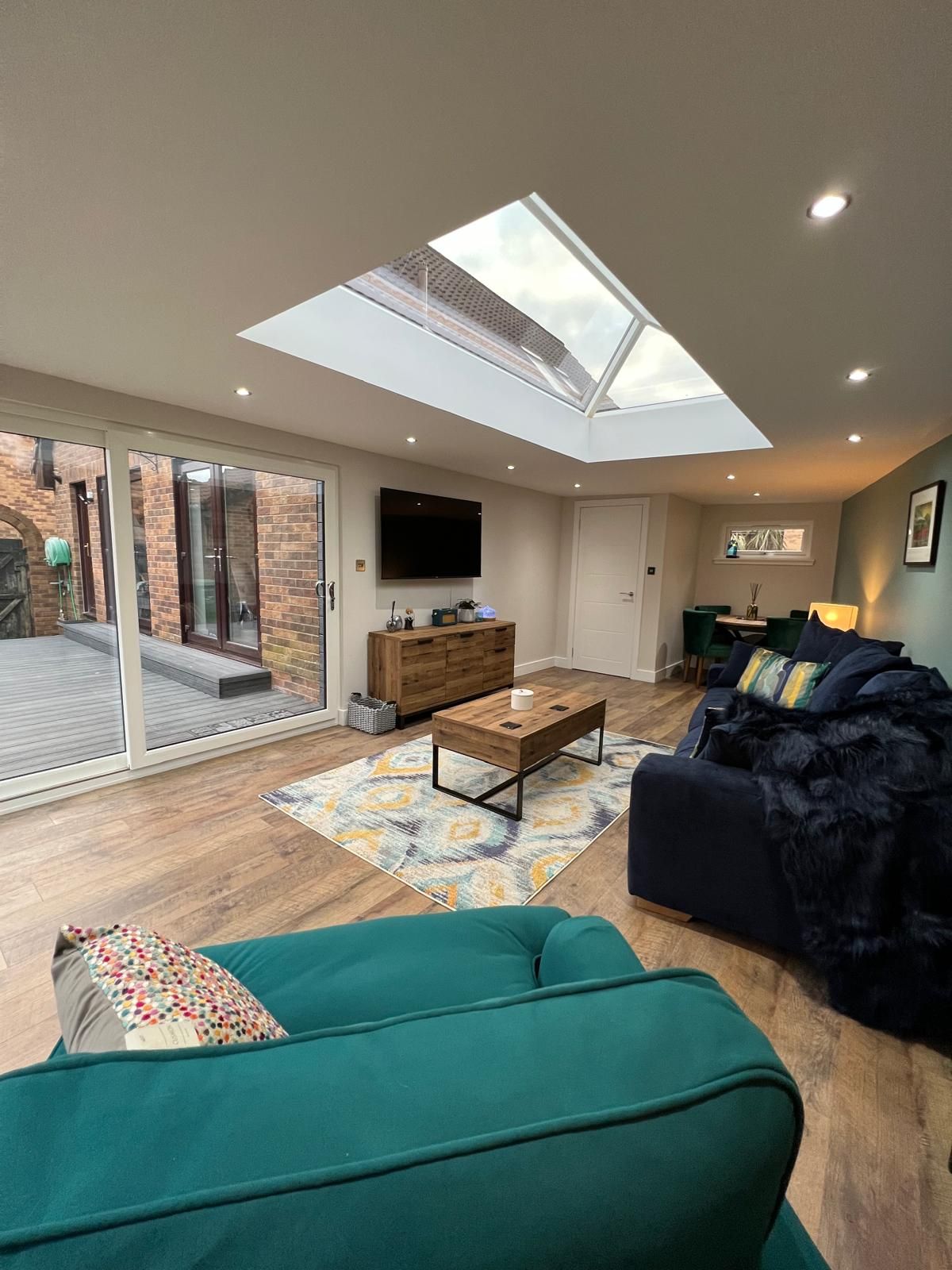Oakspan Garden Room Interior With Roof Lantern Finished Oakspan garden room interior with roof lantern, recessed lighting and glazed garden access