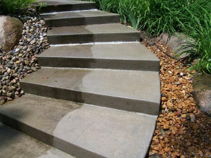 Stairs half clean, half dirty getting pressure washed in Dayton OH with Haven Hydro Clean