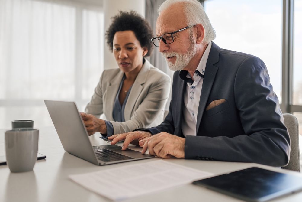 man and women looking at ROSE financial small business accounting services