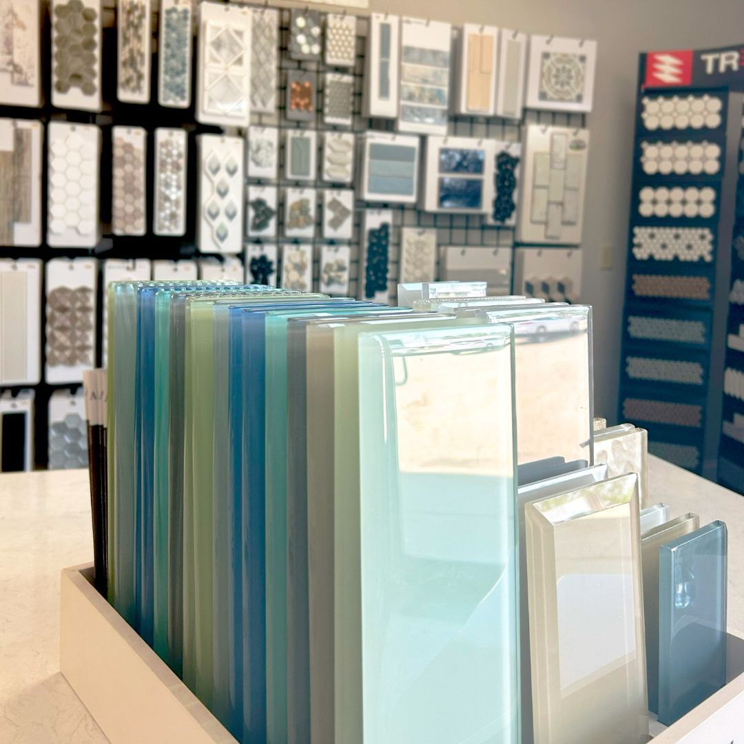 Display of translucent plastic organizers in a store aisle with shelves of packaged products in the background