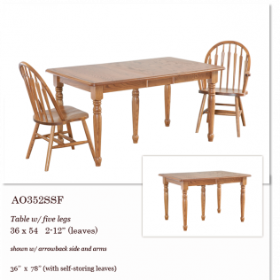 Wooden dining table with turned legs and two matching chairs on a white background