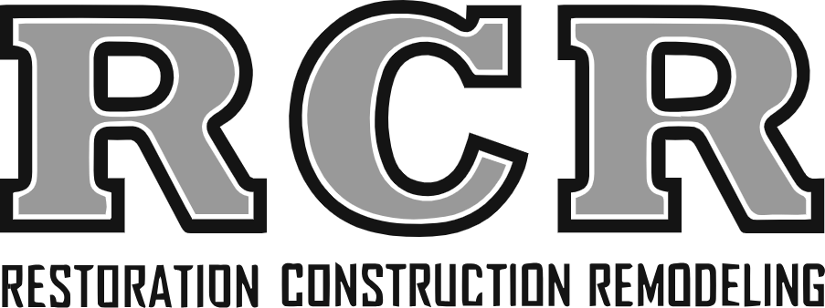 A black and white logo for restoration construction remodeling.
