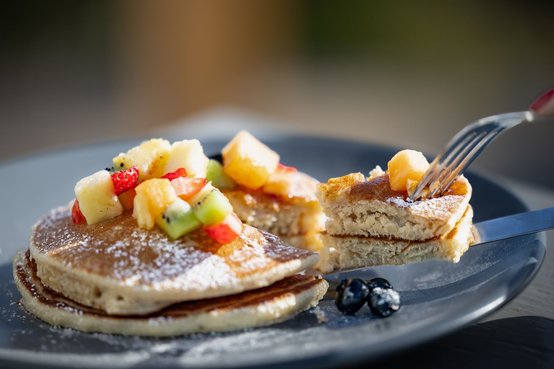 Gourmet tropical pancakes with fresh seasonal fruit served for breakfast at a luxury boutique hotel in Baja California Sur.