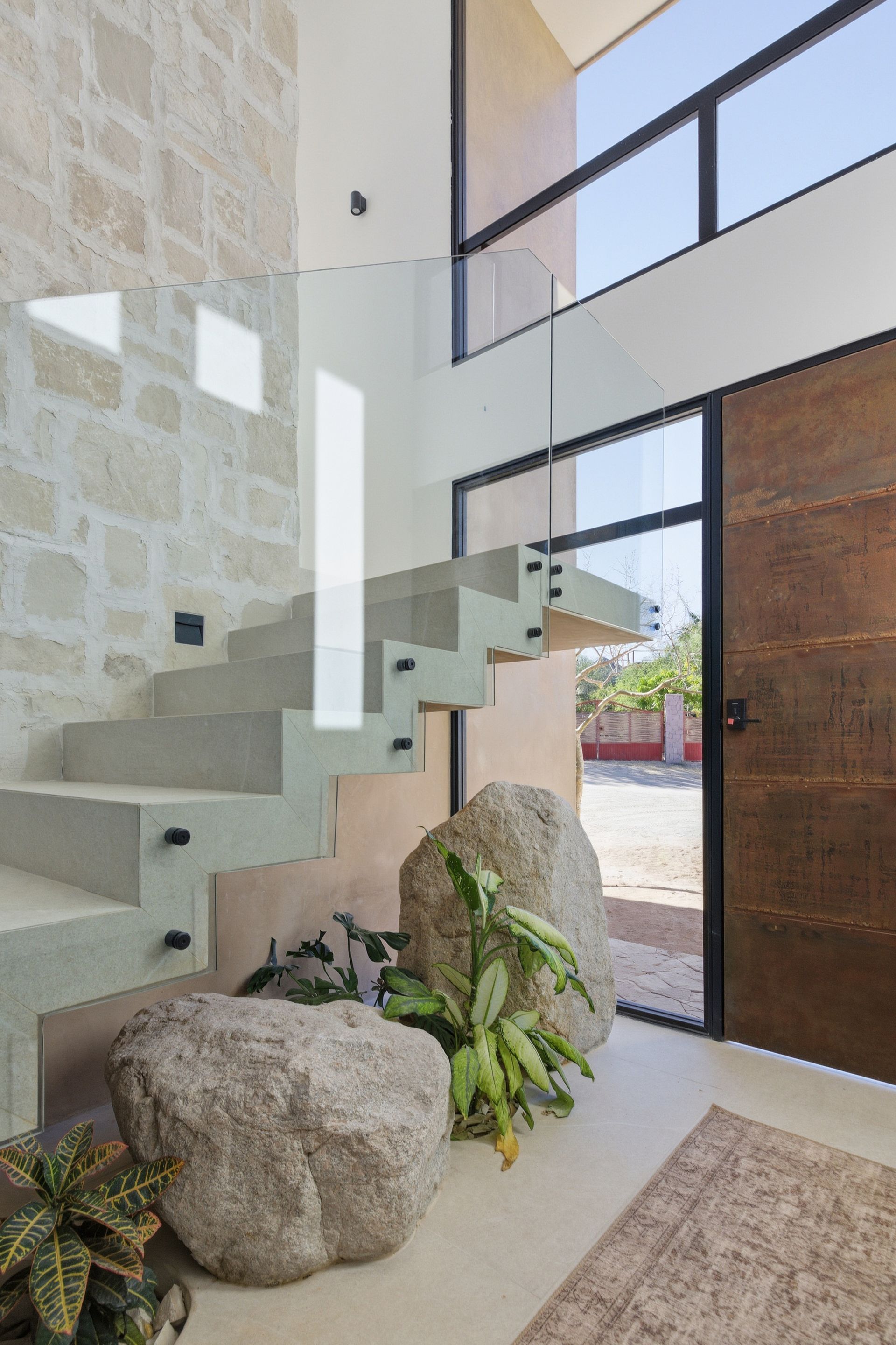 Contemporary architecture featuring natural stone and modern design at Altamira luxury condos.