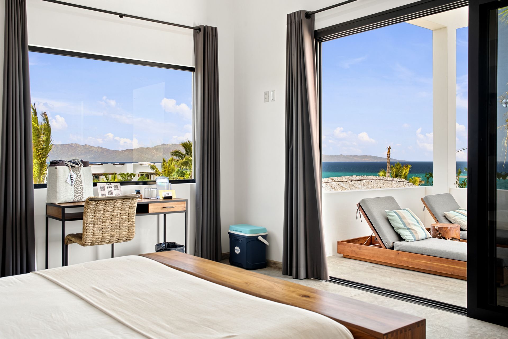 Spacious king suite with a private terrace and Sea of Cortez views at Hotel Todo Bien.