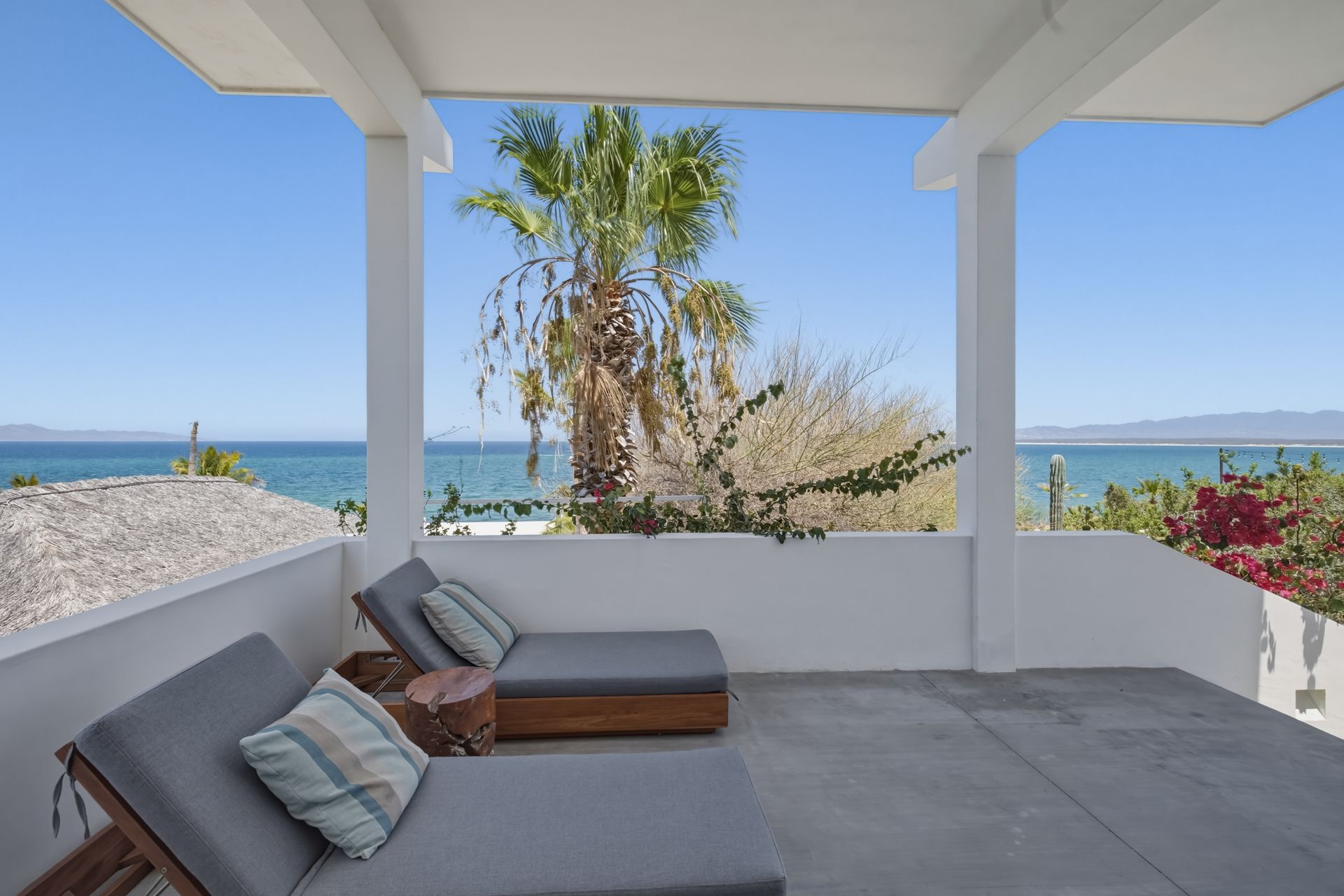 Private terrace with panoramic ocean views at luxury hotel in La Ventana.