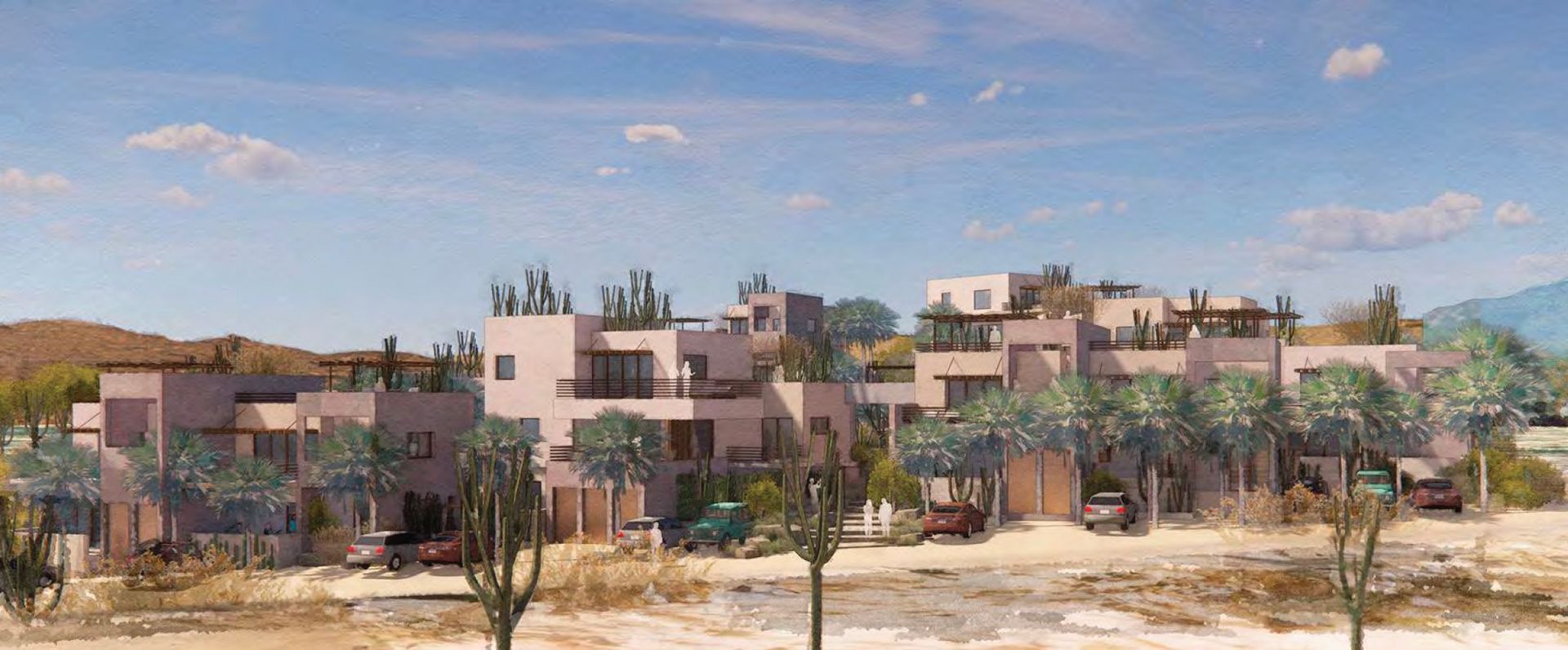 A desert community with stucco buildings, cacti, and palm trees under a bright blue sky.