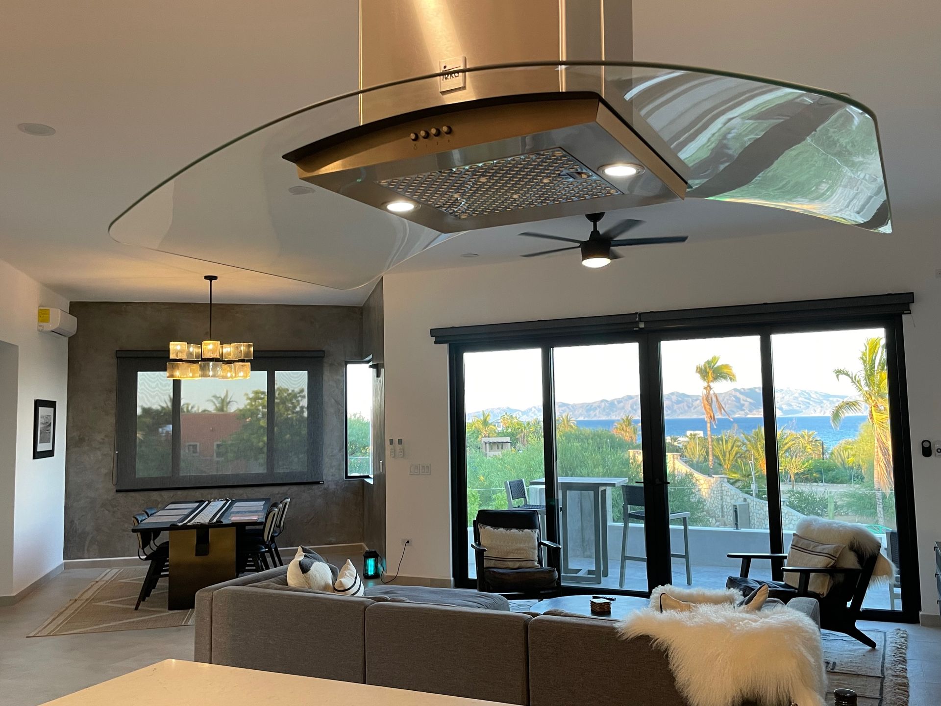 Open-concept kitchen leading to a private terrace with Sea of Cortez views.