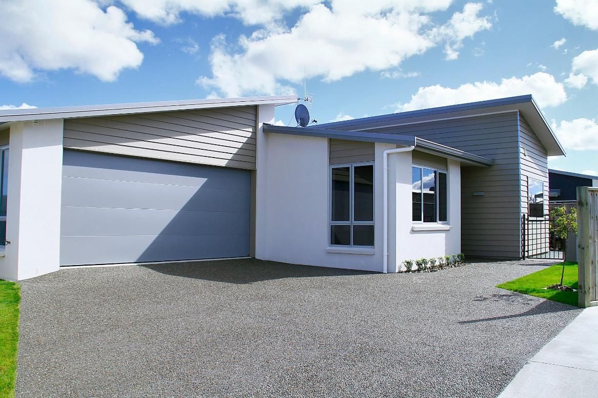 A White House With A Satellite Dish On The Roof — Gold Coast Door Centre In Burleigh Heads, QLD