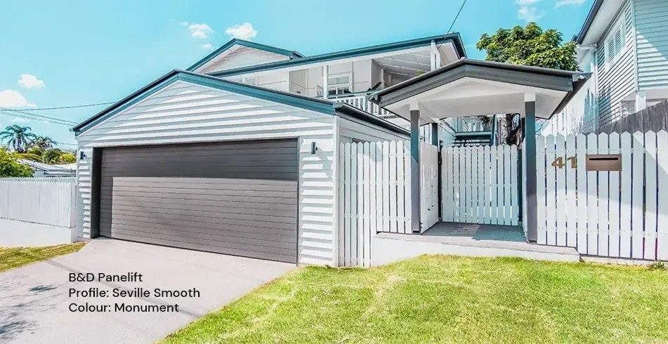A House with A Gray Garage Door — Gold Coast Door Centre In Burleigh Heads, QLD