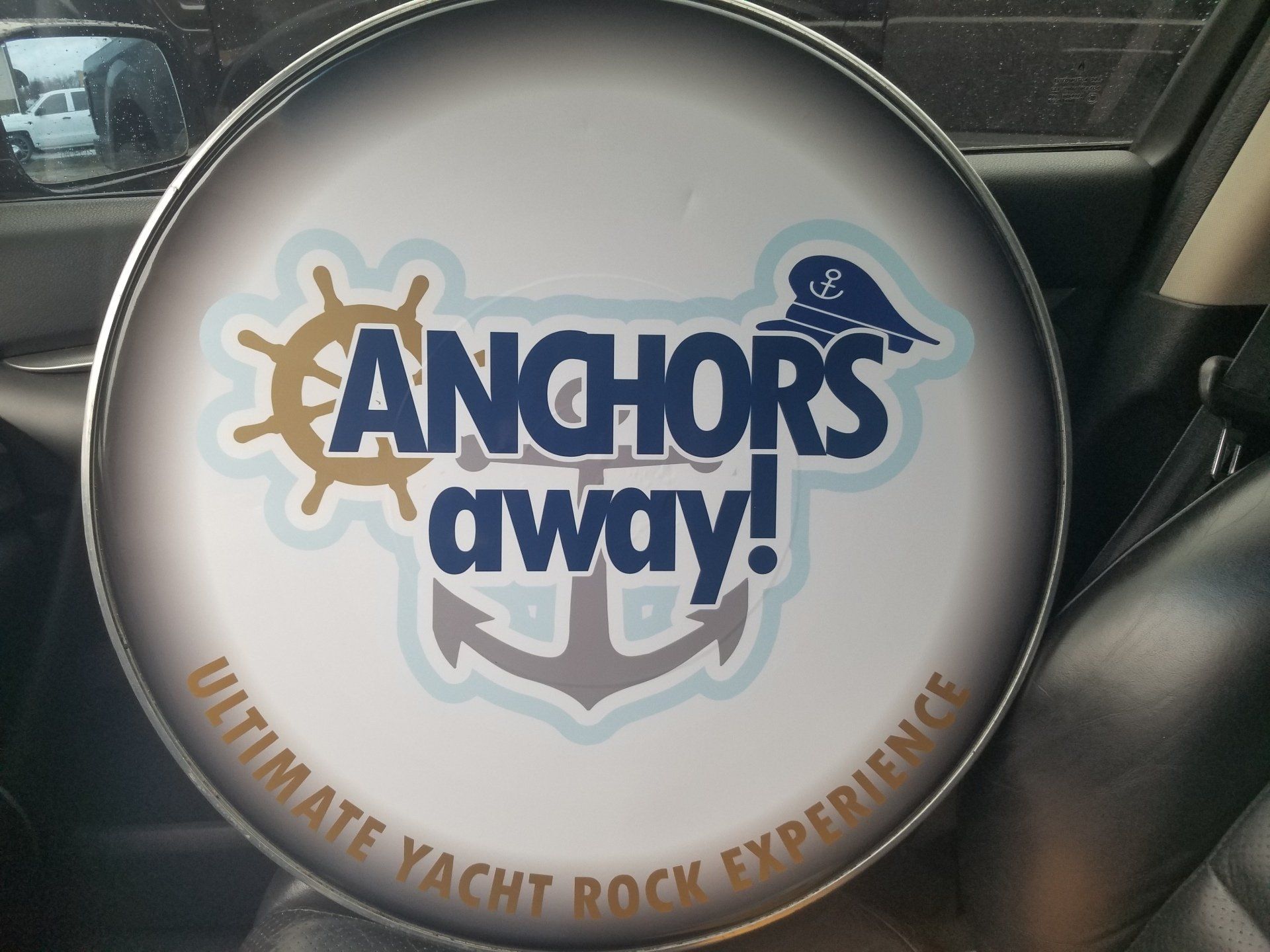 A sign that says anchors away ultimate yacht rock experience
