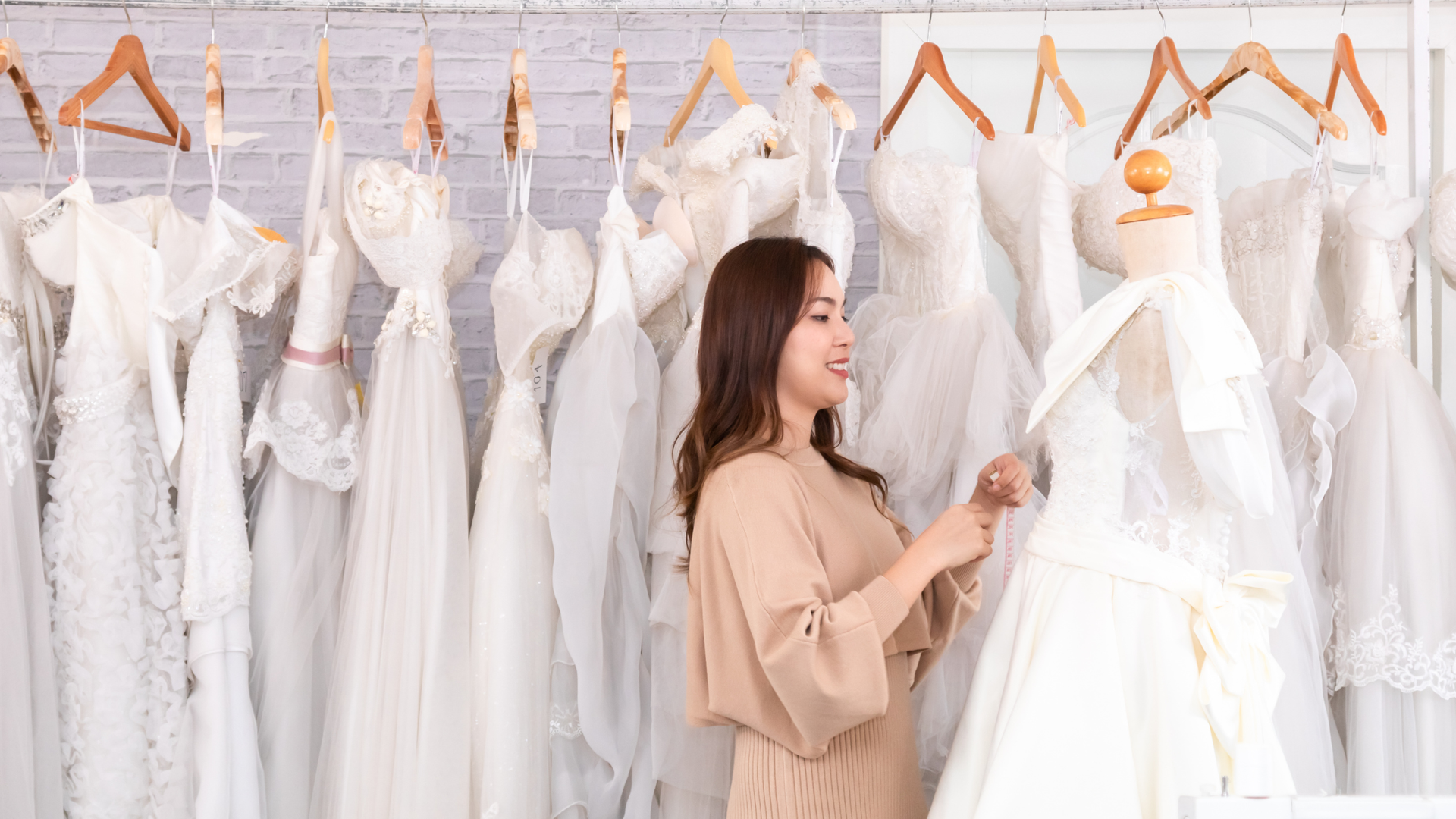 BridalLive inventory dashboard displaying wedding gown listings with style numbers, sizes, and designer names.