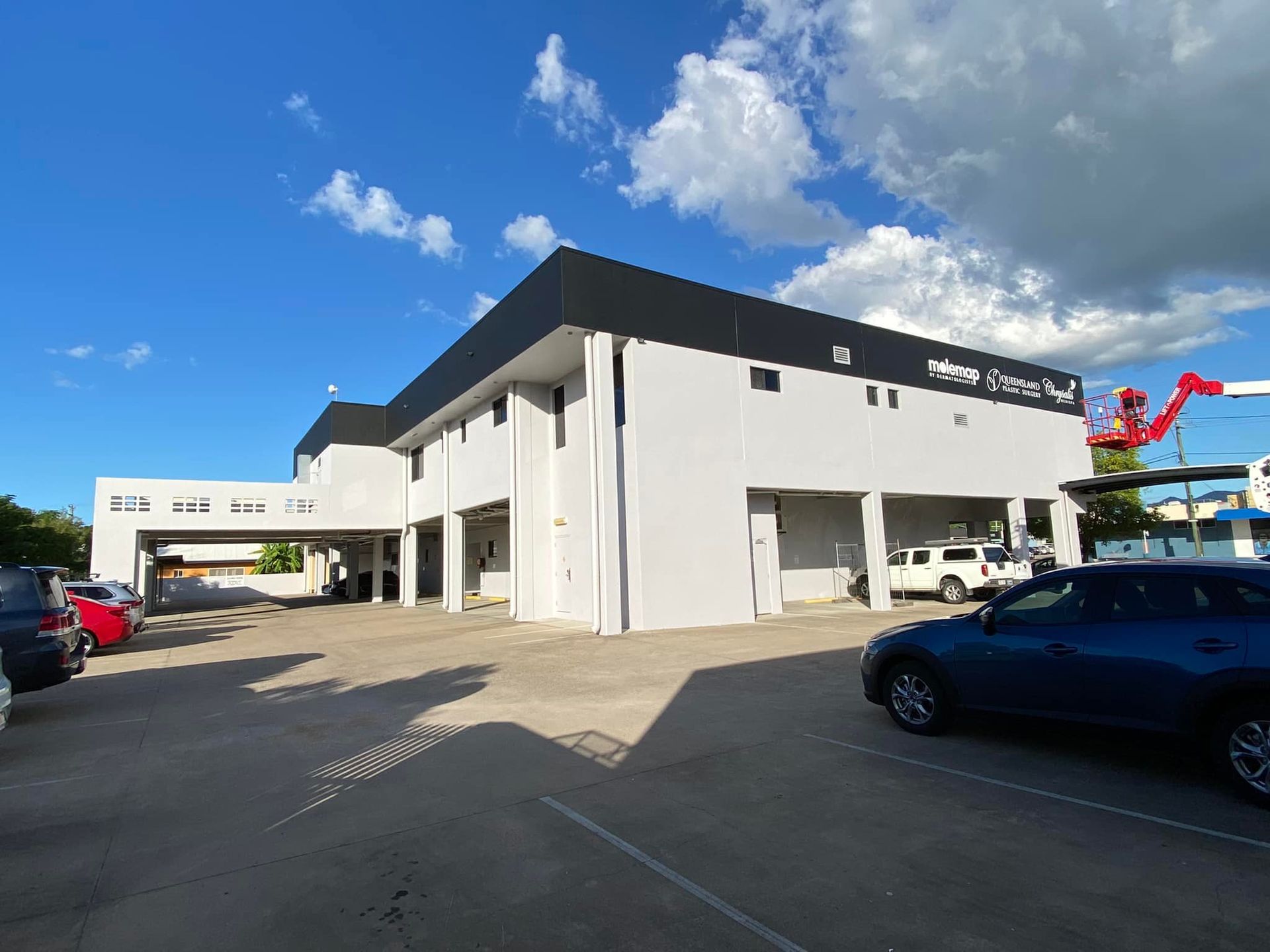 A Building With A Painted Roof — Marteene Painting Services In Kirwan, QLD