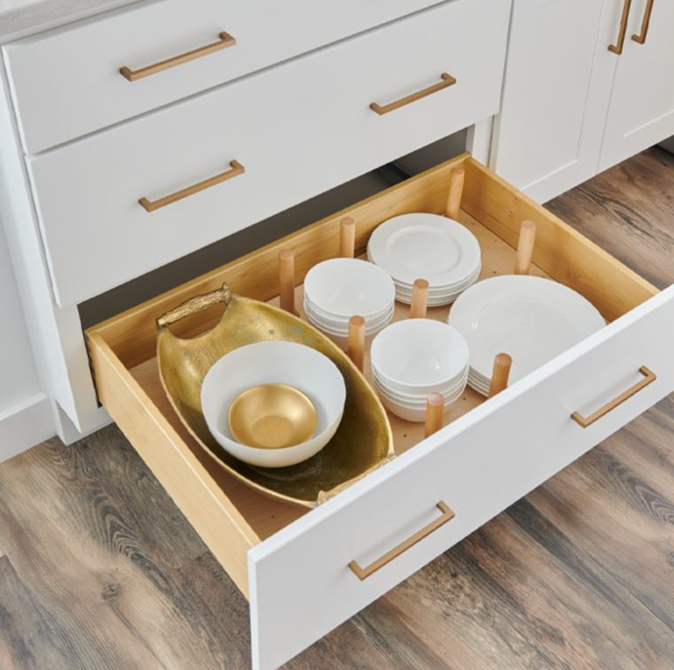 Drawer with custom wood dividers for dishes and bowls — organized kitchen
