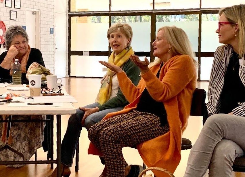 Community members attend a Good for the Hood workshop with facilitator Jo Taranto to discuss safe climate efforts and resilience.