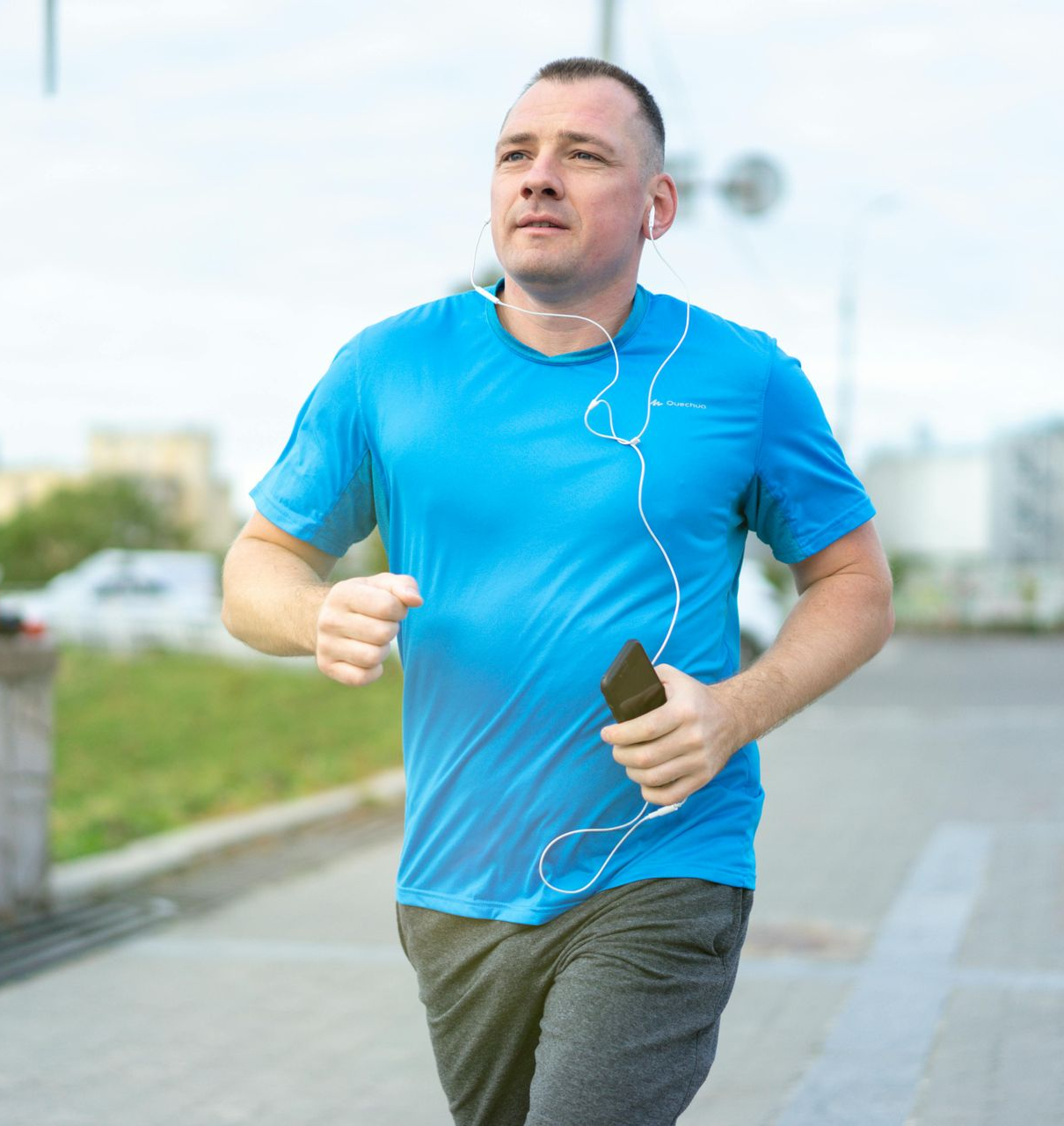 Man training with improved energy and strength through TRT at Boston Beautox
