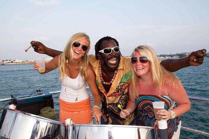 Dolphin Watching & Snorkeling in Key West with Sunset Dinner Cruise and Open Bar