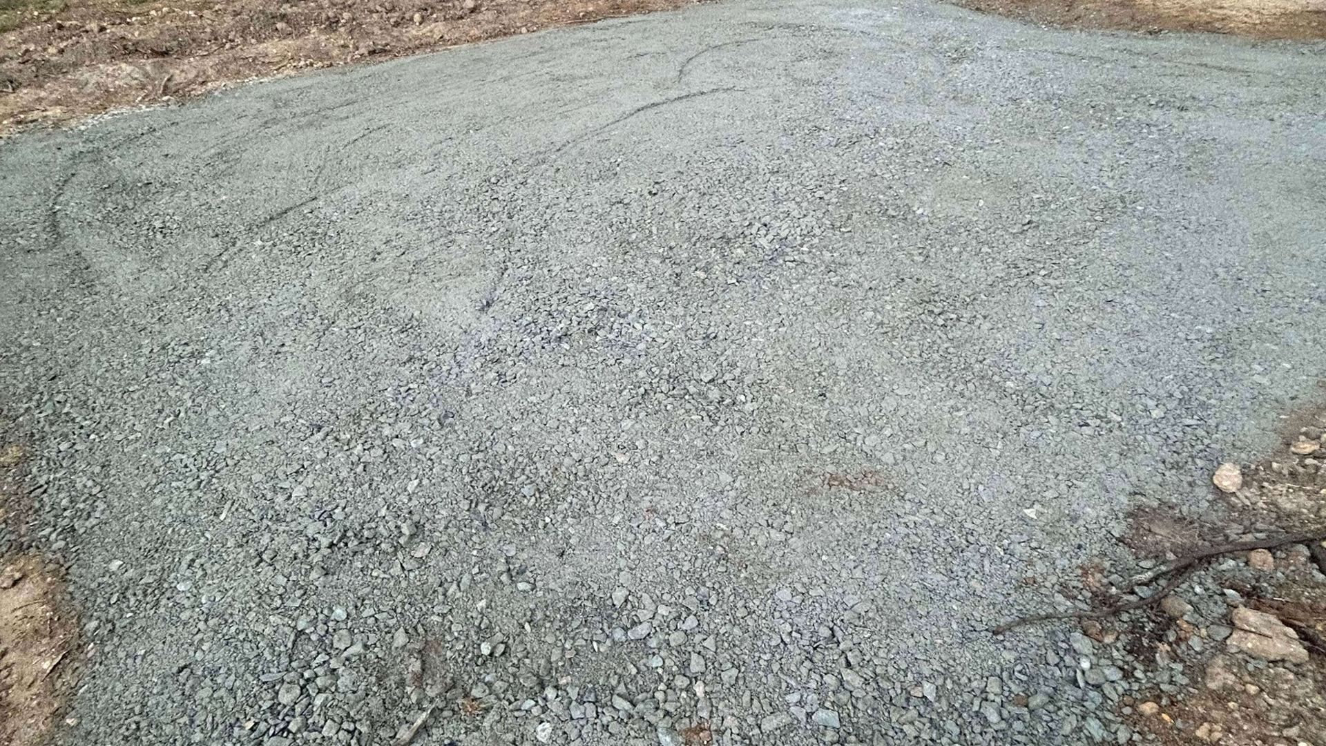 Finished compacted gravel foundation prepared for paver patio installation by Tayeb's Landscaping in Chesterfield County, VA.