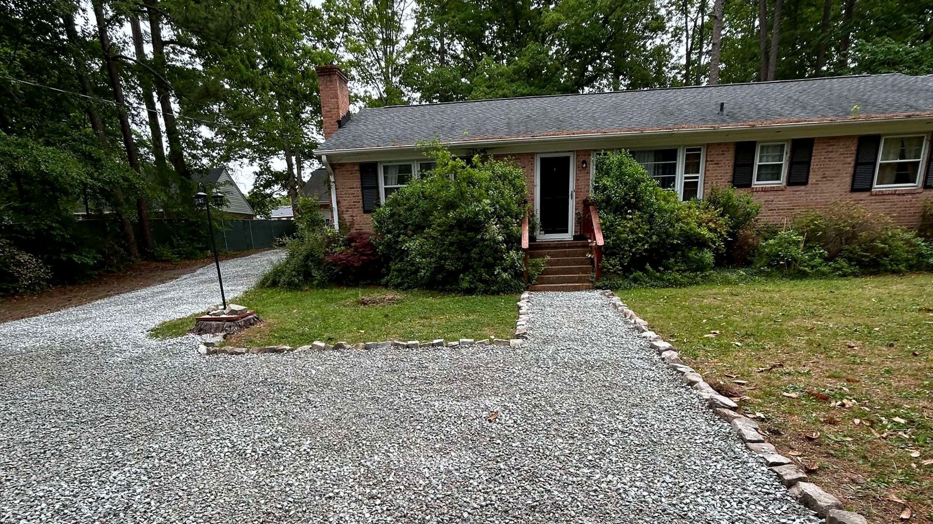 Completed gravel driveway installation in Chesterfield, VA by Tayeb Landscaping