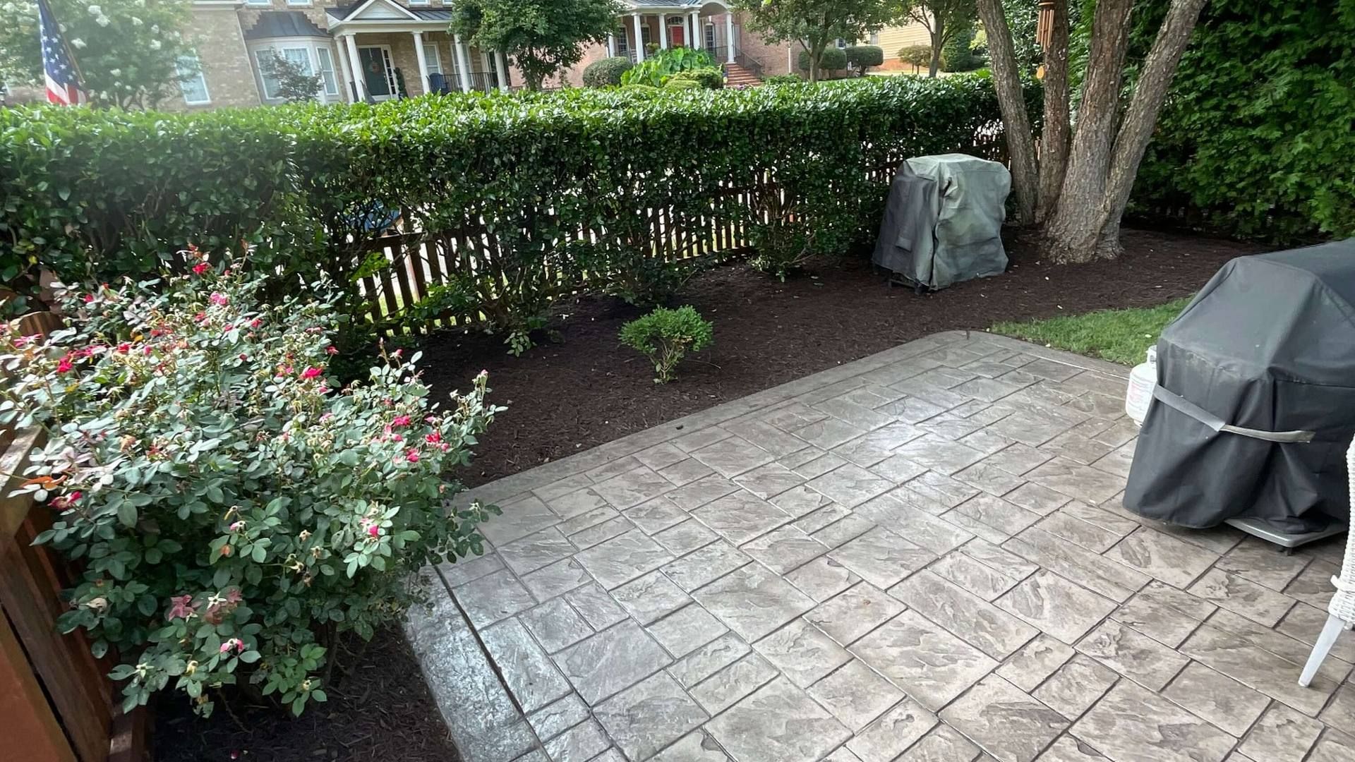 Increased curb appeal with new shrub and fresh mulch in Chesterfield County.