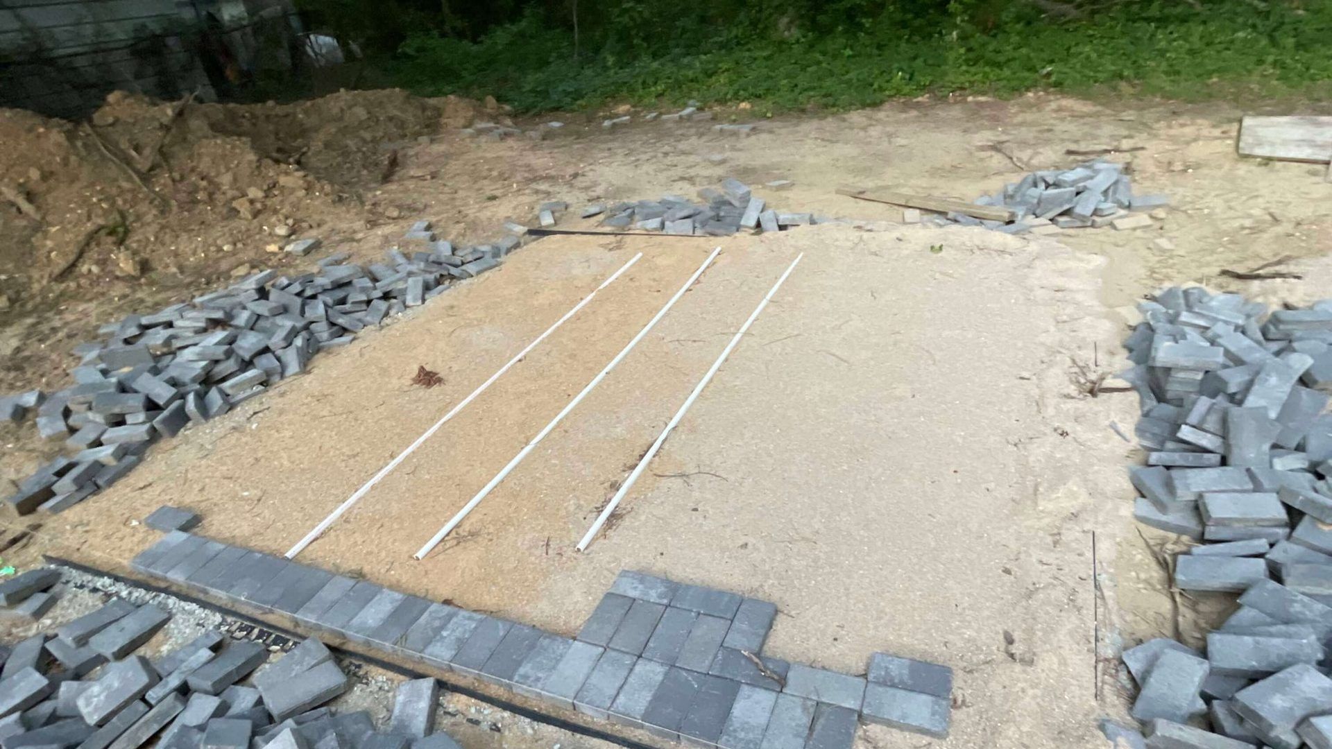 Base preparation for a custom paver patio installation by Tayeb's Landscaping in Chesterfield, VA.