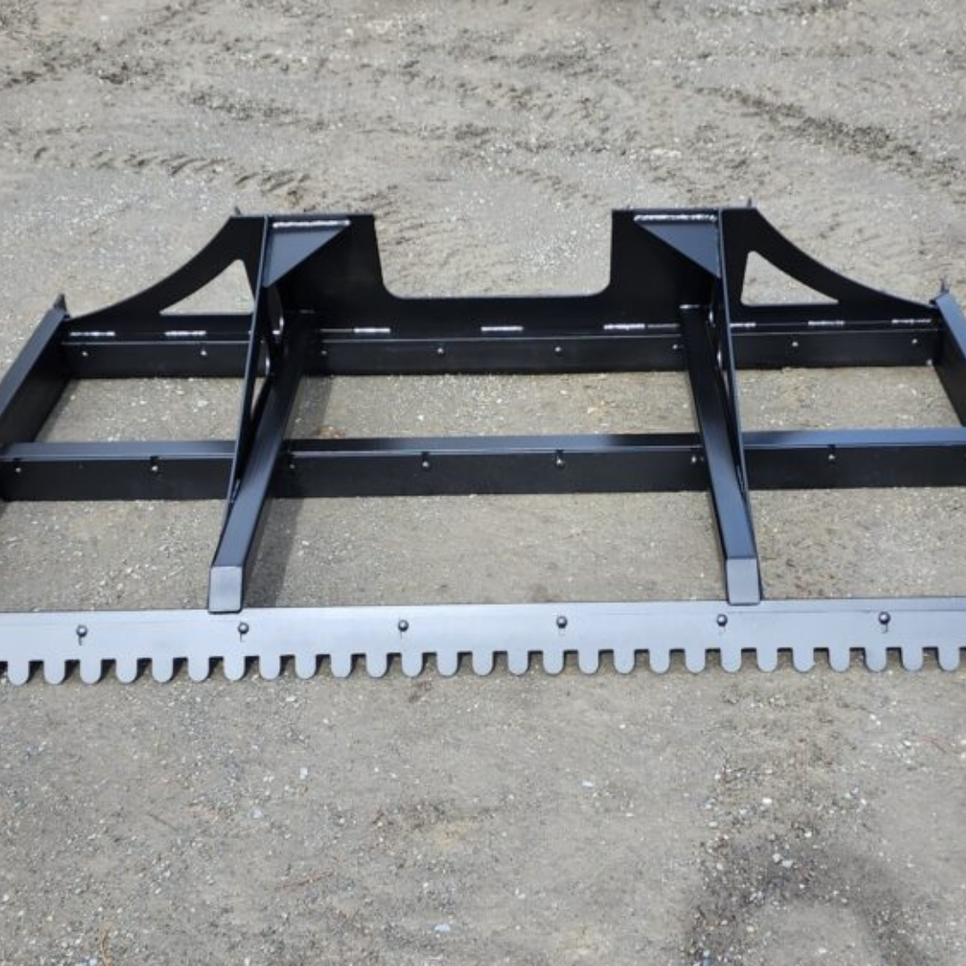 A black metal item is sitting on the ground